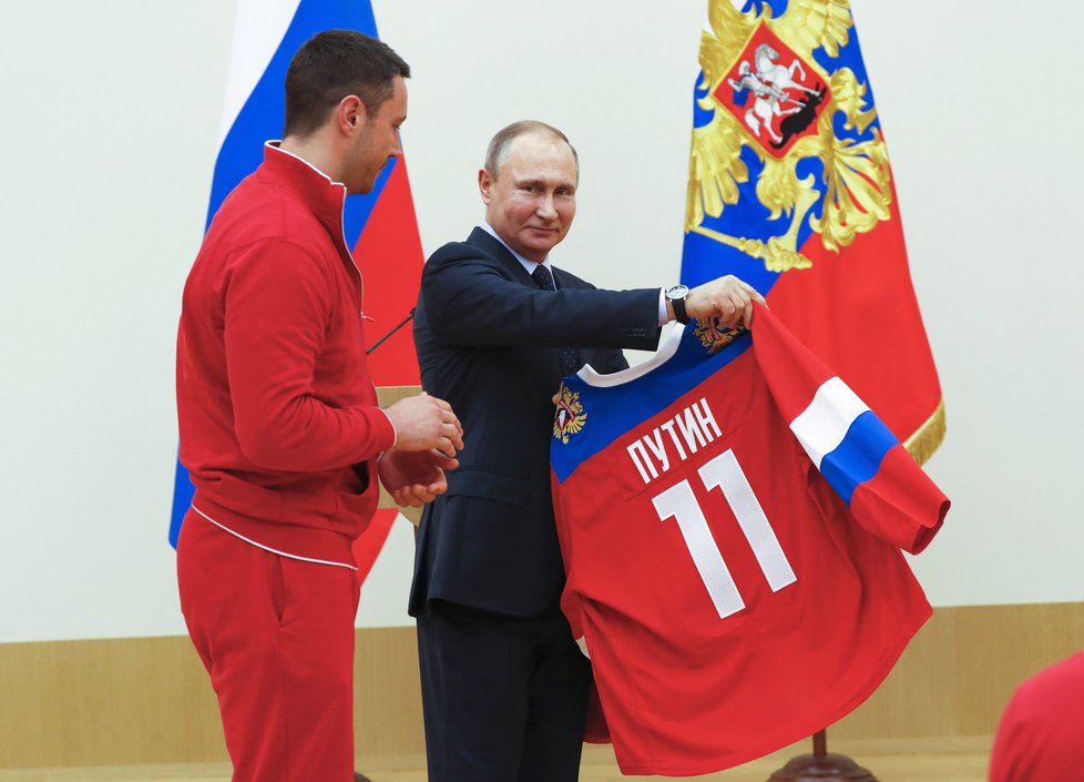 Prezident Vladimir Putin a ruští sportovci.