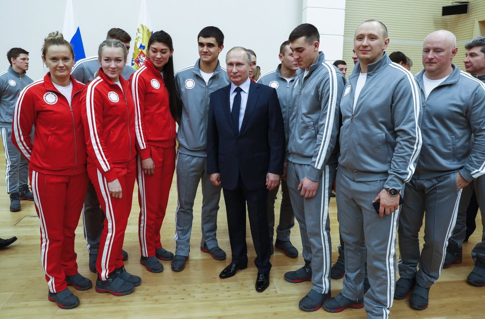 Prezident Vladimir Putin a ruští sportovci.