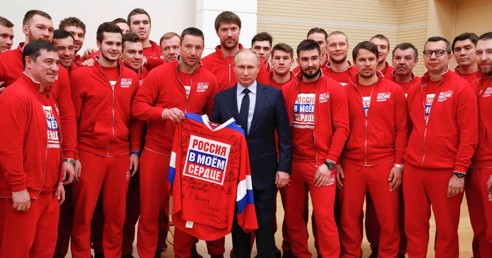 Prezident Vladimir Putin a ruští sportovci.