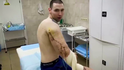 Kirill po operaci odumřelých částí paže.