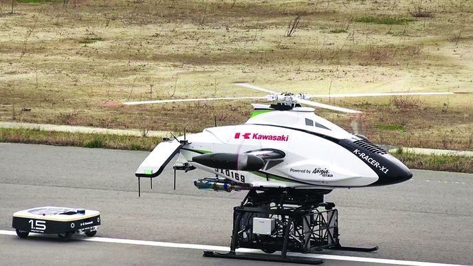 Dron K-Racer X1 předvádí spolupráci s pozemním doručovacím robotem