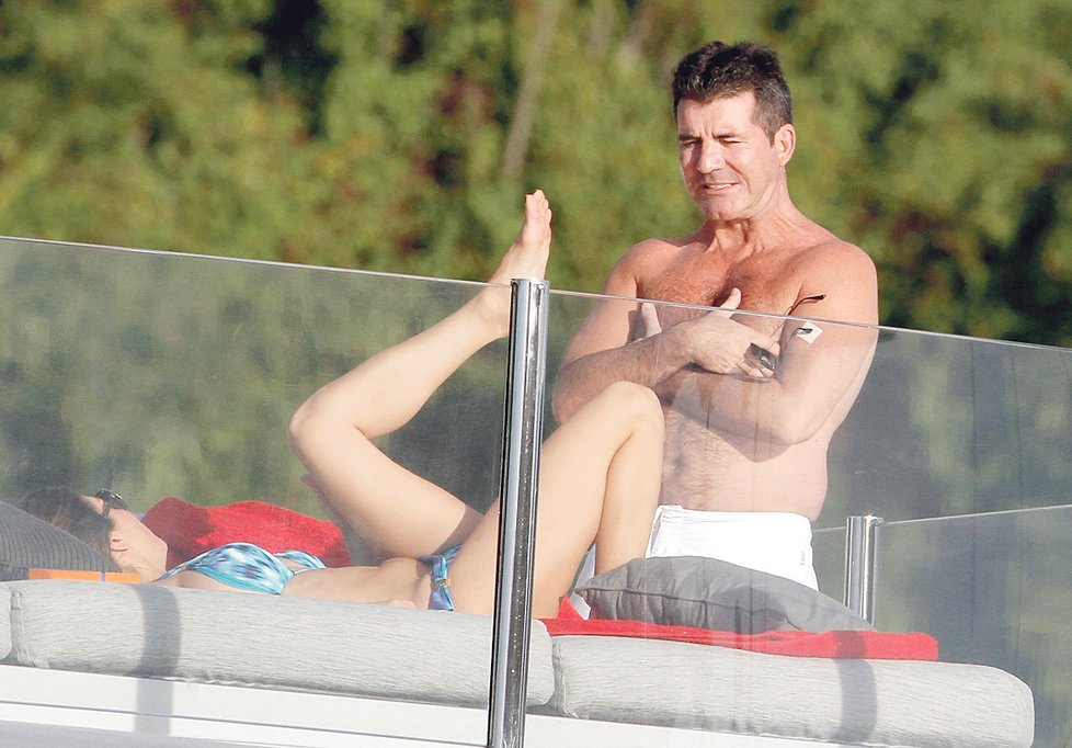 Simon Cowell s partnerkou