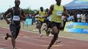 Jamajský sprinter Usain Bolt (vpravo).