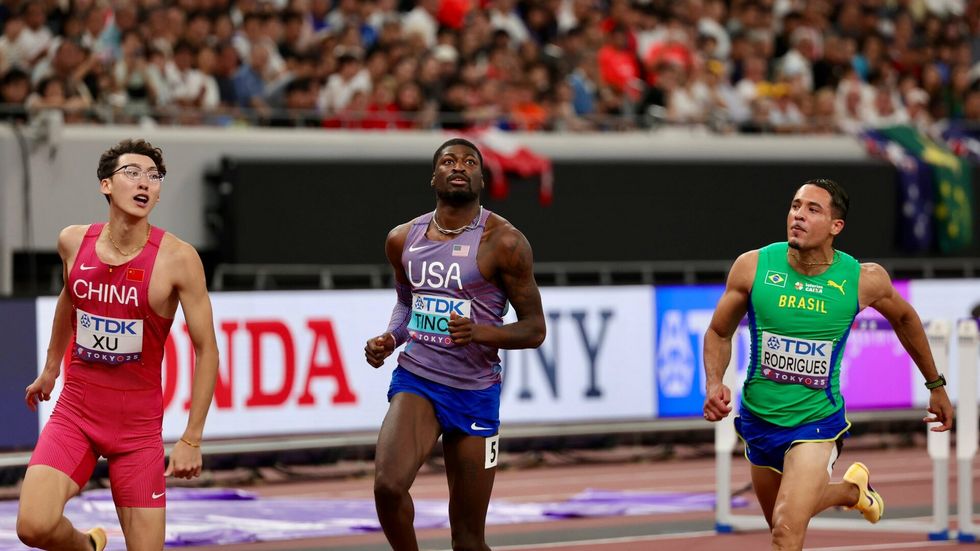 Americký překážkář Cordell Tinch na mistrovství světa v Japonsku