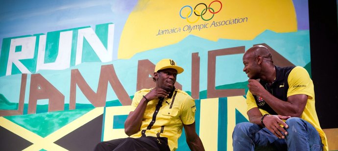 Jamajský sprinter a jeho kolega Asafa Powell před objektivy fotoaparátů
