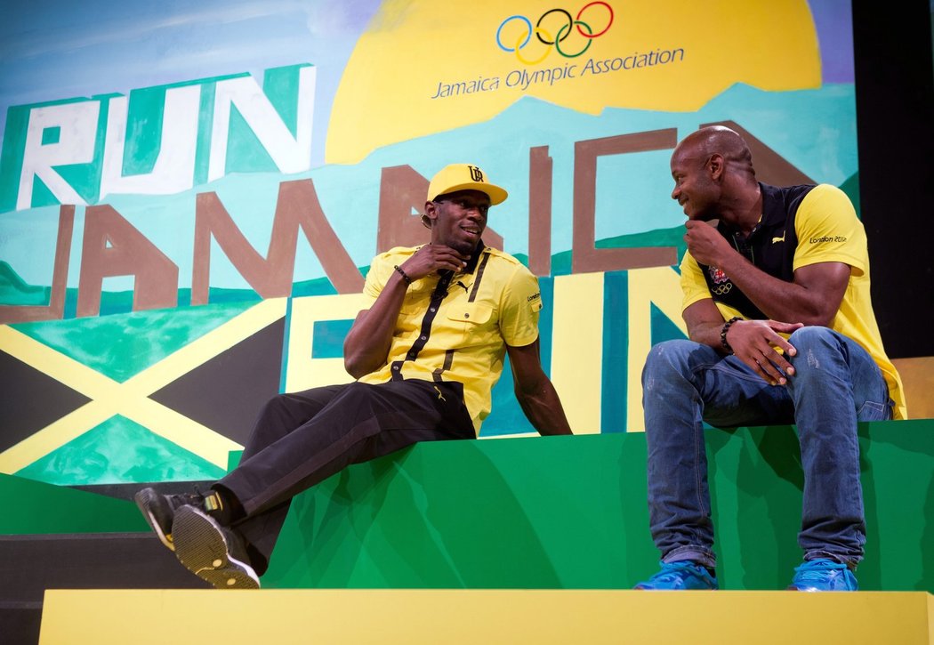 Jamajský sprinter a jeho kolega Asafa Powell před objektivy fotoaparátů