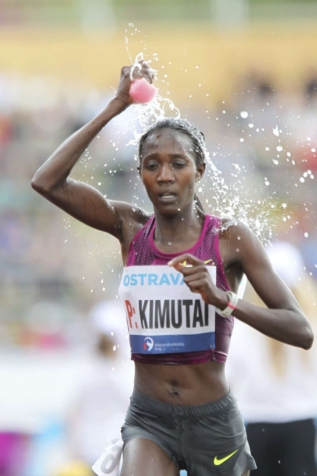 Vítězka závodu v běhu na 20 km Alice Kimutaiová z Keni.