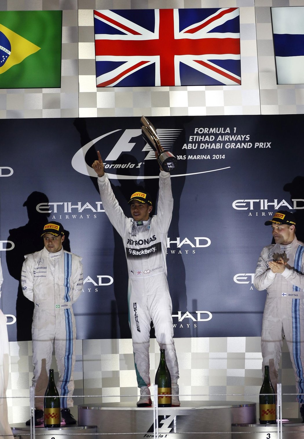 Stupně vítězů: Zleva Felipe Massa, Lewis Hamilton a Valtteri Bottas