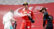 Sebastian Vettel slaví své druhé místo z Rakouska