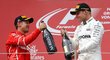 Sebastian Vettel a Valtteri Bottas na stupních vítězů v Rakousku