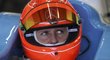 Michael Schumacher v oranžové helmě se znakem Mercedesu