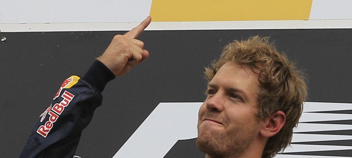 Sebastian Vettel se raduje z vítězství ve Velké ceně Belgie