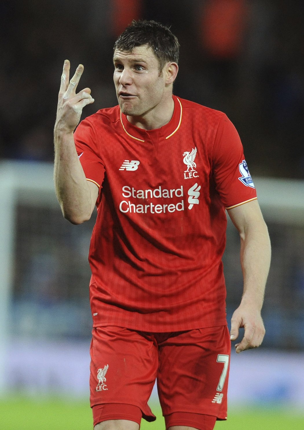 Záložník Liverpoolu James Milner