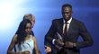 Usain Bolt ve společnosti oceněné Almaz Ayany z Etiopie.