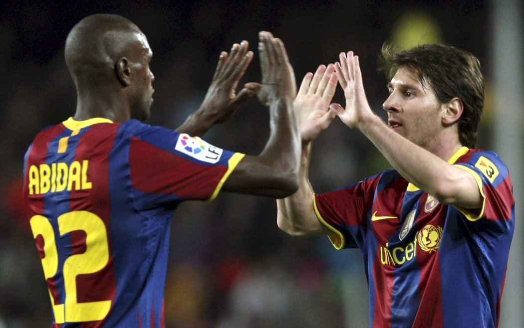 Abidal a Messi slaví první gól zápasu.