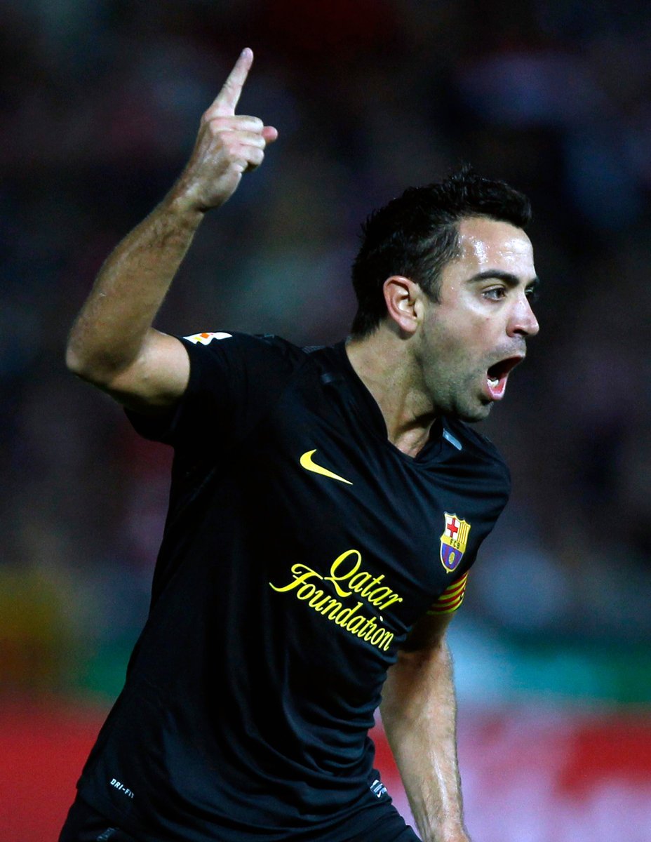 Xavi oslavuje svůj gól do sítě Granady.
