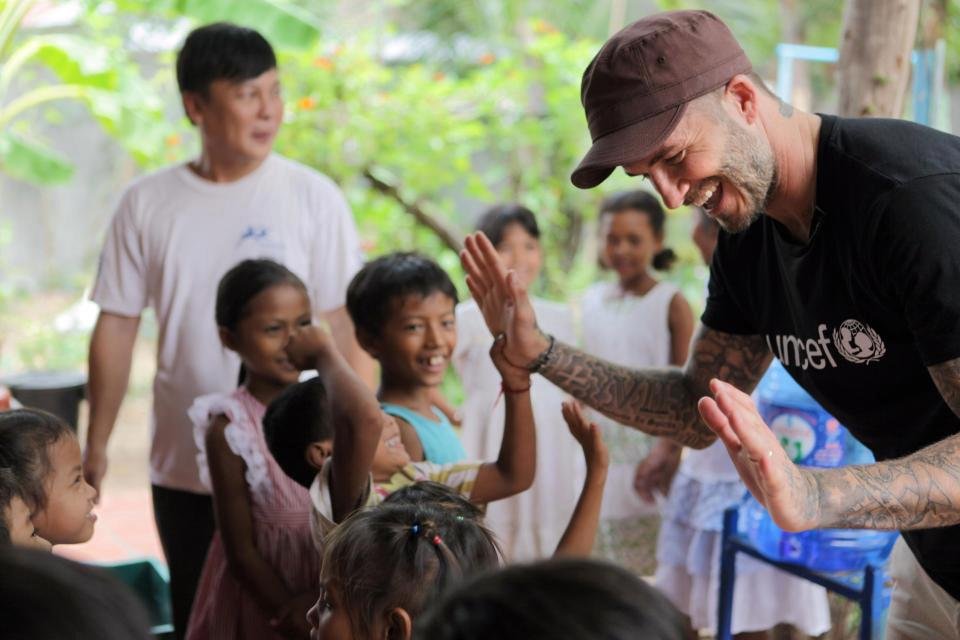 David Beckham rád zveřejňuje fotky z charitativnich akcí.