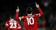 Philippe Coutinho slaví svůj poslední gól za Liverpool do sítě Swansea