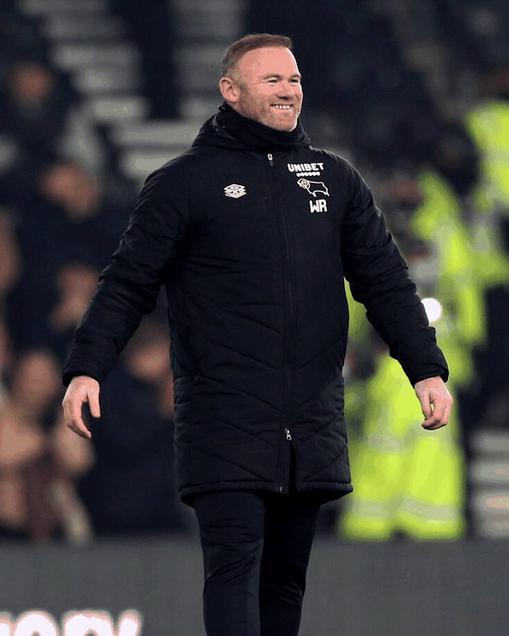 Vysmátý Wayne Rooney během zápasu