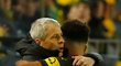 Jadon Sancho s trenérem Dortmundu Lucienem Favrem