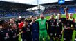 Fotbalisté Slavie se radují ze zisku mistrovského titulu na půdě Baníku Ostrava