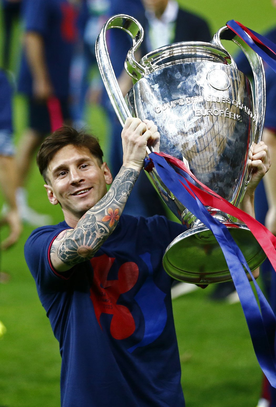 Lionel Messi s pohárem pro vítěze Ligy mistrů