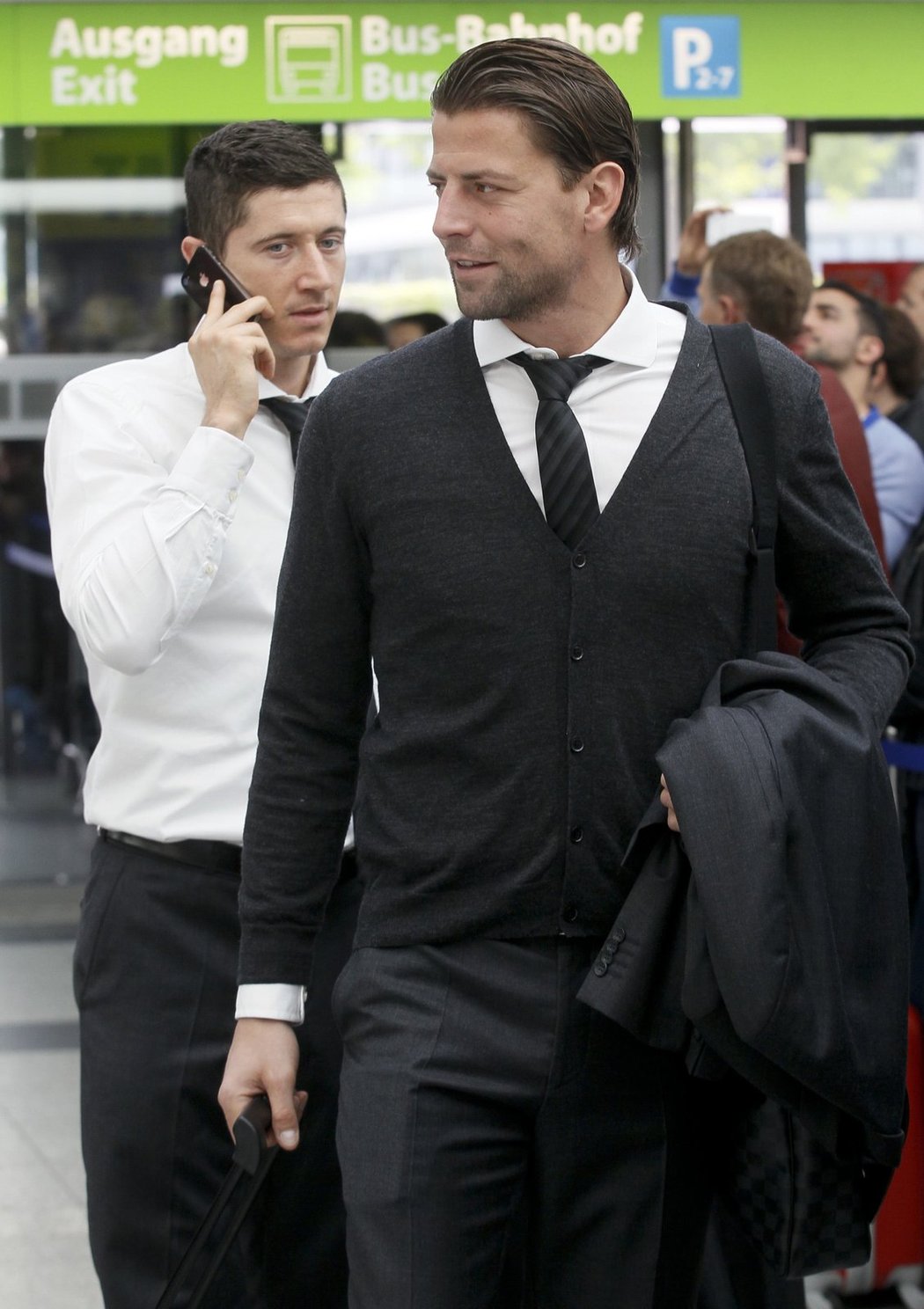 Weidenfeller a Lewandowski po příjezdu na dortmundské letiště