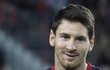 Barcelona&#39;s Lionel Messi poses with the golden boot trophy before their Spanish First division soccer league match at Camp Nou stadium in Barcelona, November 3, 2012. REUTERS/Albert Gea (SPAIN - Tags: SPORT SOCCER)