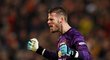 Brankář Manchesteru United David de Gea se raduje z gólu Scotta McTominaye do sítě Arsenalu