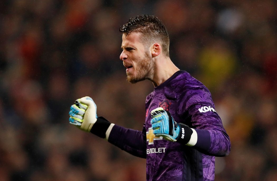 Brankář Manchesteru United David de Gea se raduje z gólu Scotta McTominaye do sítě Arsenalu