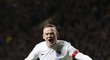 Wayne Rooney se raduje z gólu do sítě Skotska