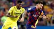 Barcelonský Lionel Messi uniká André-Frankovi Zambovi Anguissaovi z Villarrealu