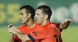 Lionel Messi s Pedrem slaví gól Barcelony do sítě Levante
