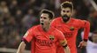 Lionel Messi a Gerard Piqué se radují po brance do sítě Valencie