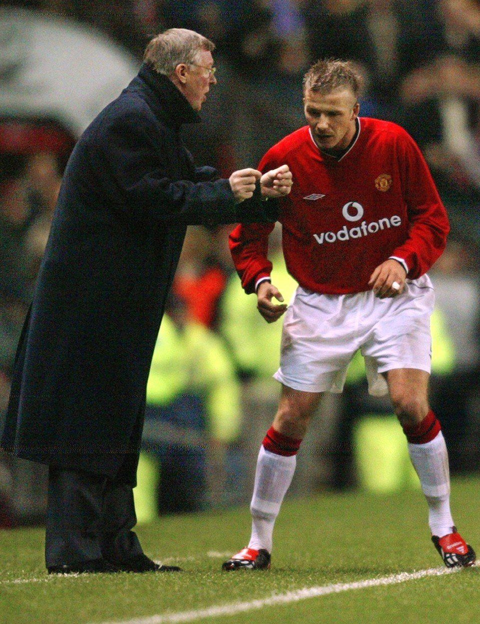 David Beckham v době, kdy nastupoval za Manchester United. Poslouchá pokyny sira Alexe Fergusona