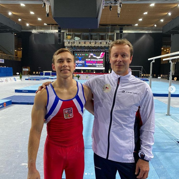 Gymnasta David Jessen s trenérem