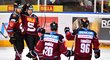 Hokejisté Sparty se radují z gólu Lukáše Rouska (druhý zleva)