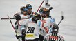 Hokejisté Sparty se radují z gólu obránce Maxima Matuškina (uprostřed) při jeho premiéře za Spartu