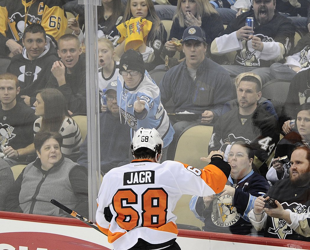 Celebrating a goal to the Penguins net.