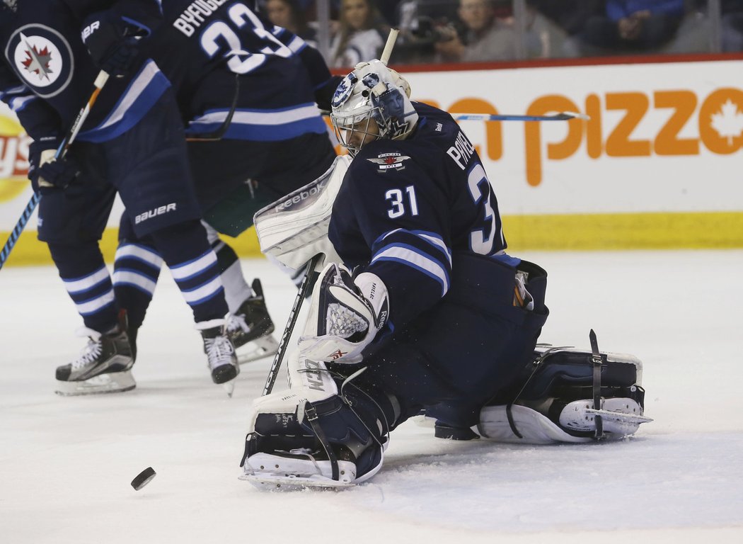 Ondřej Pavelec pochytal 28 střel hráčů Wild