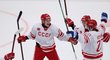 Ruští hokejisté slaví gól do finské sítě