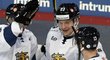 Finští hokejisté zleva Miika Koivisto, Joonas Kemppainen a Julius Juntilla se radují ze vstřelené branky proti Rusku