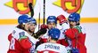 Čeští hokejisté se radují z gólu, uprostřed Radan Lenc