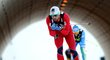 Norský finišman Petter Northug vyjíždí z tunelu na novoměstské trati