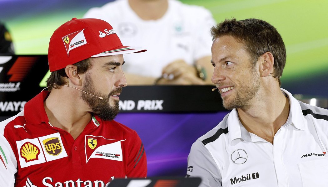 Fernando Alonso a Jenson Button - od příští sezony parťáci.