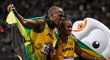 Usain Bolt s krajanem Blakem si vychutnávají euforii po olympijské stovce
