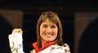 Česká akrobatická lyžařka Nikola Sudová během představení olympijského oblečení pro Hry v Soči