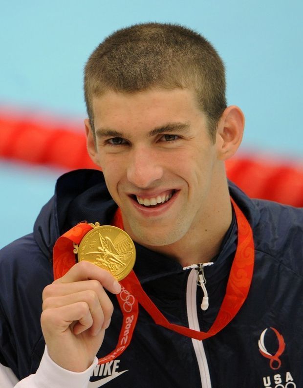 Michael Phelps se zlatou medailí Michael Phelps se zlatou medailí