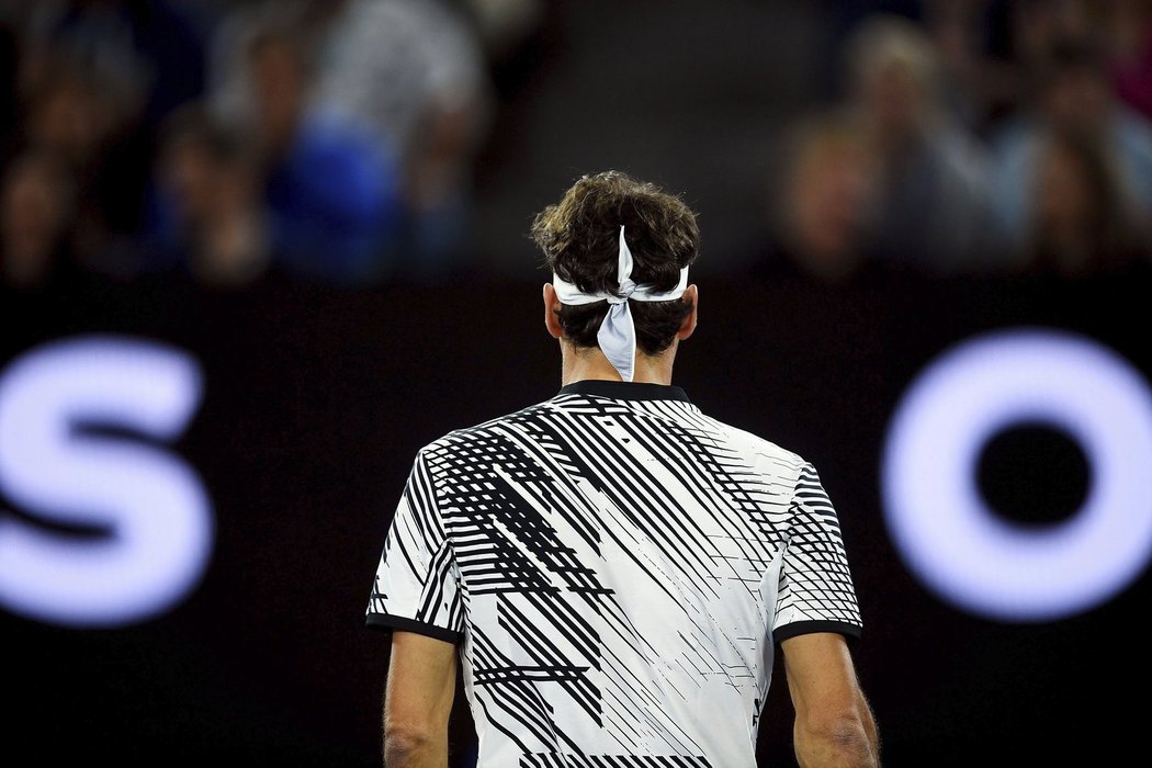 Švýcarská legenda Roger Federer v zápase s Tomášem Berdychem