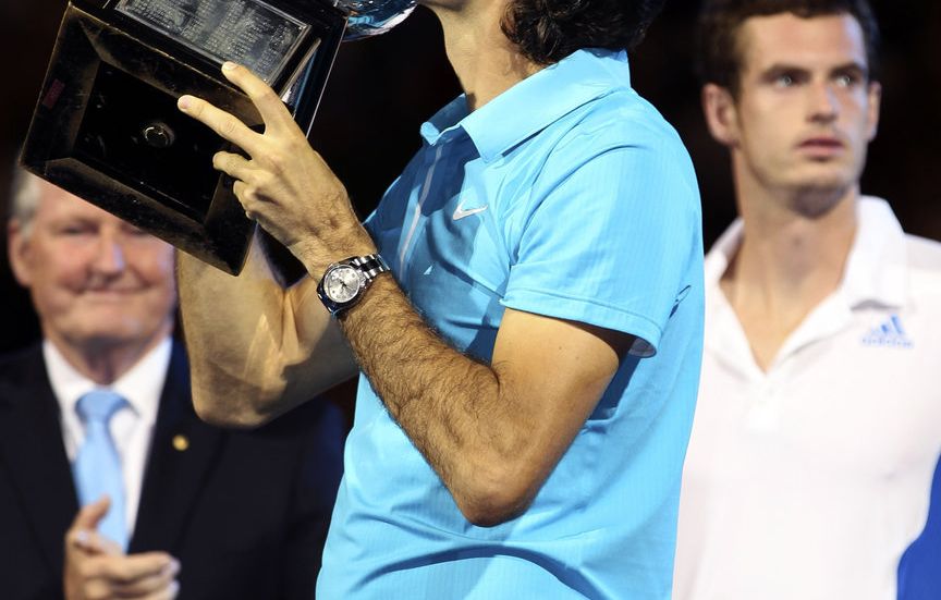 Švýcarský tenista s vítěznou trofejí